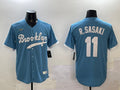 Men’s Los Angeles Dodgers Roki Sasaki #11 Light Blue Cooperstown Collection Jersey